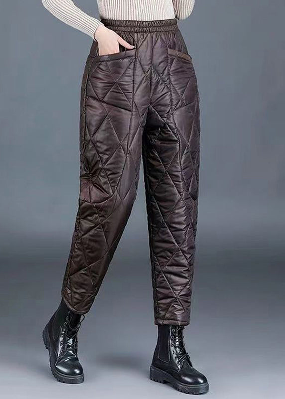 Pantalones harén de algodón fino, de cintura alta y gruesos, con bolsillos de color café.