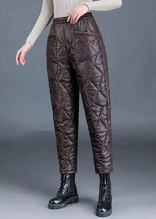 Pantalones harén de algodón fino, de cintura alta y gruesos, con bolsillos de color café.