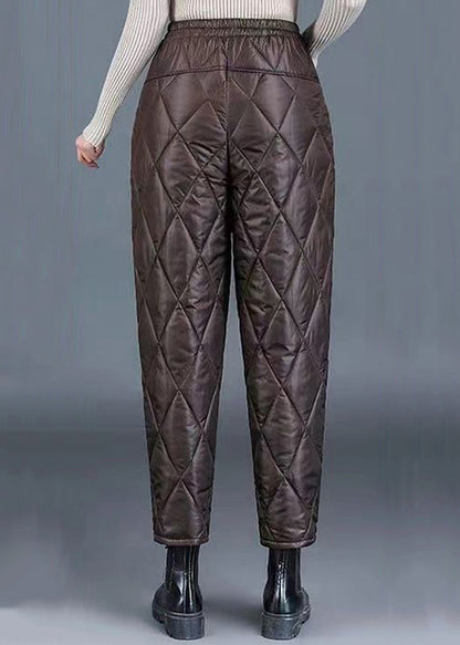 Pantalones harén de algodón fino, de cintura alta y gruesos, con bolsillos de color café.