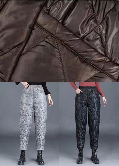 Pantalones harén de algodón fino, de cintura alta y gruesos, con bolsillos de color café.