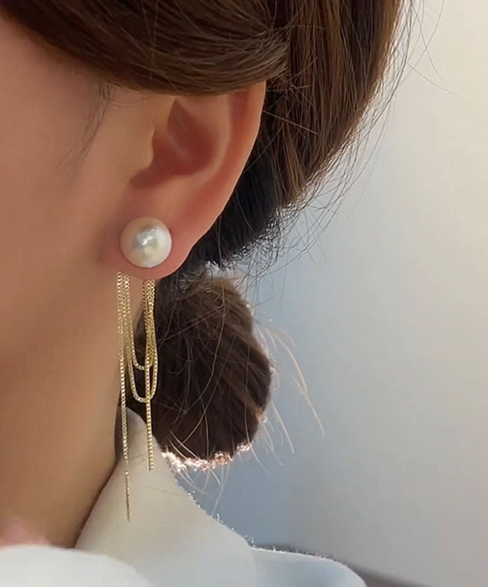 Schlichte Ohrringe mit Perlenquaste in Gold und Kupfer