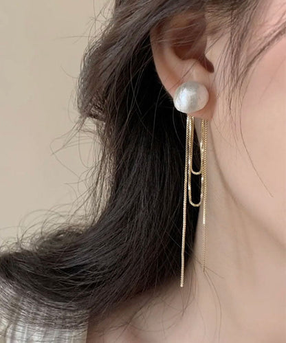 Schlichte Ohrringe mit Perlenquaste in Gold und Kupfer