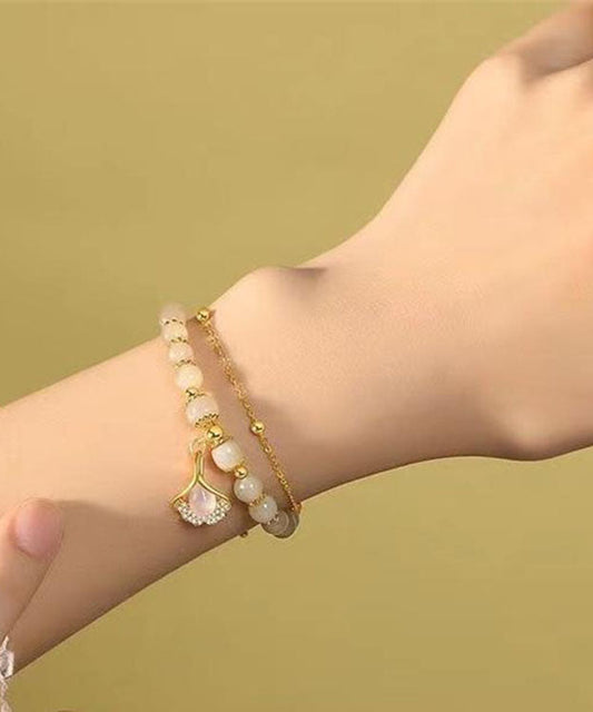 Schlichtes hellgrünes Sterlingsilber-Armband mit vergoldetem Zirkonia-Jade und Ginkgoblatt