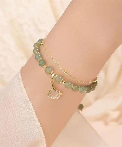 Schlichtes hellgrünes Sterlingsilber-Armband mit vergoldetem Zirkonia-Jade und Ginkgoblatt