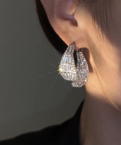 Pendientes sencillos de aleación de seda con forma de gota de agua y arco de circonita