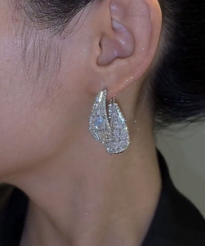 Pendientes sencillos de aleación de seda con forma de gota de agua y arco de circonita