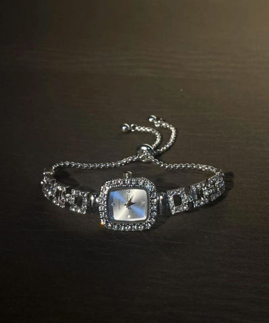 Relojes sencillos de acero inoxidable con cadena de eslabones de azúcar y circonitas.