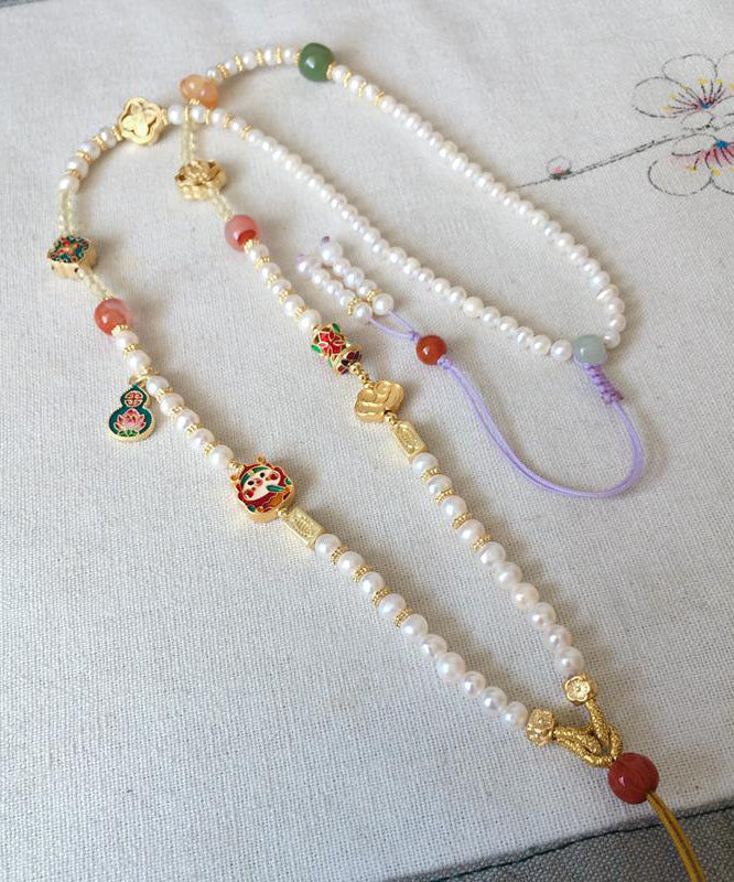 Collar sencillo con colgante de borla de calabaza y perla de circonita dorada en plata de ley blanca