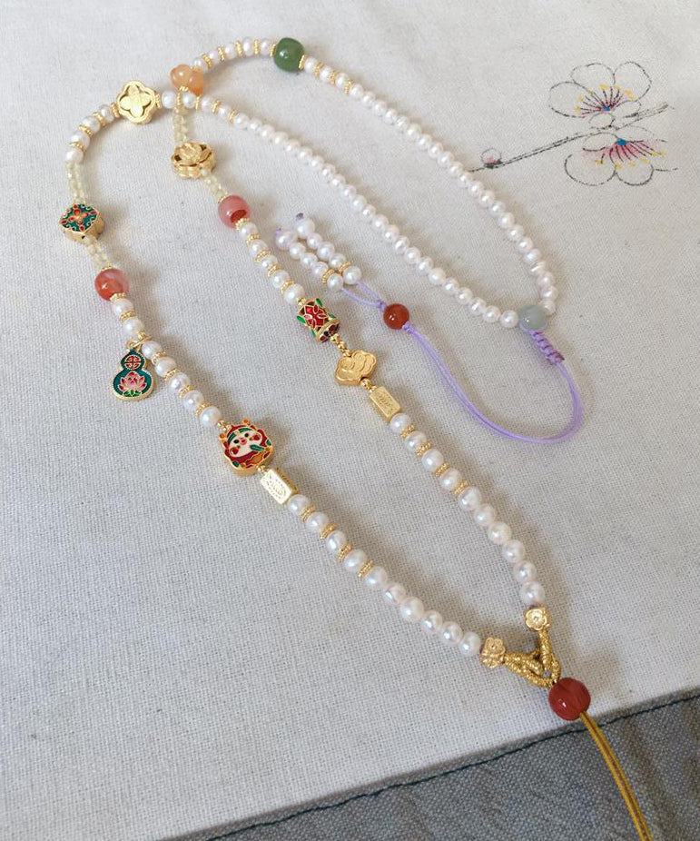 Collar sencillo con colgante de borla de calabaza y perla de circonita dorada en plata de ley blanca