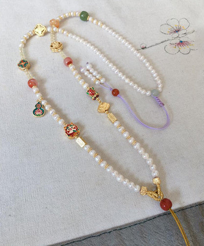 Collar sencillo con colgante de borla de calabaza y perla de circonita dorada en plata de ley blanca