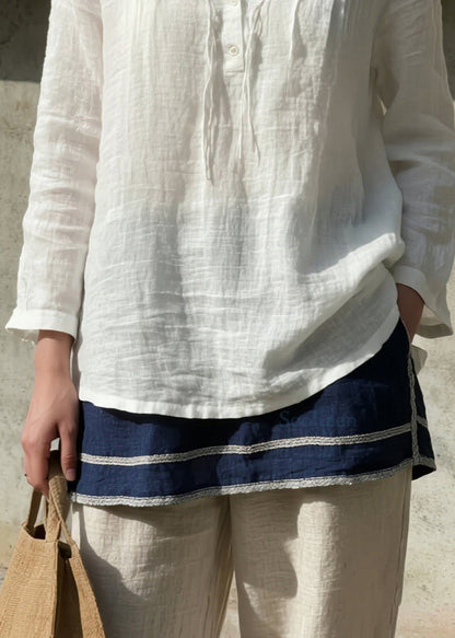 Camisa blanca sencilla de algodón con cuello en V para primavera