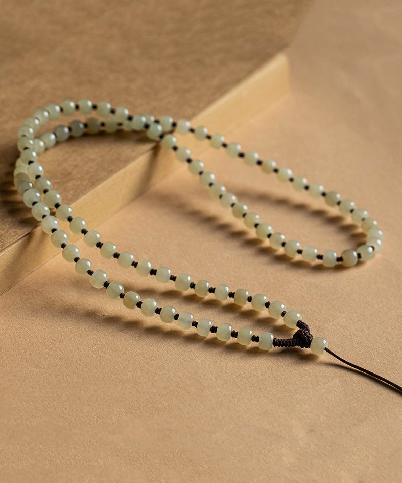 Collar sencillo de cuentas graduadas con borlas de bolas de manzana de jade amarillo