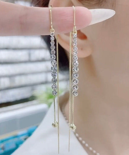 Pendientes finos de aleación de cobre azul con incrustaciones de circonitas y borlas