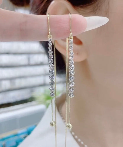 Pendientes finos de aleación de cobre azul con incrustaciones de circonitas y borlas