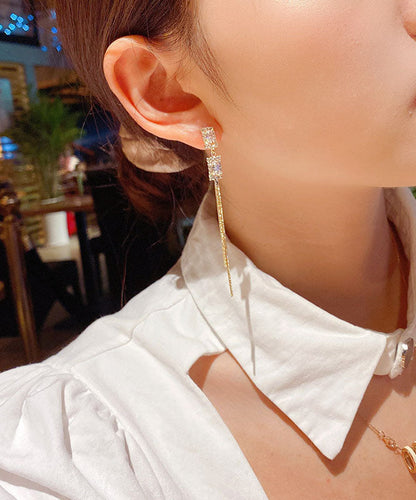 Schmale Ohrringe mit geometrischen Blöcken und Quaste aus Gold-Kupferlegierung und eingelegtem Zirkonia