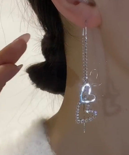 Pendientes finos de seda con borlas de circonitas