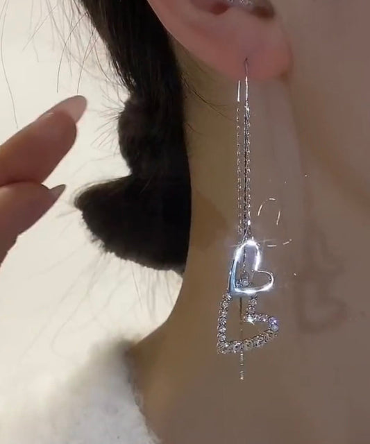 Pendientes finos de seda con borlas de circonitas