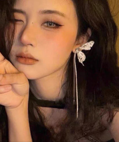 Pendientes colgantes de borla de mariposa de plata de ley y seda fina