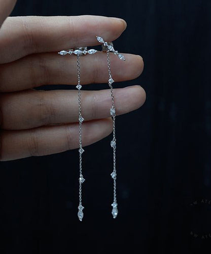 Schmale Ohrhänger aus Sterlingsilber mit Zirkonia-Quaste, verziert mit zarten Seidenquasten und vergoldeten Strasssteinen