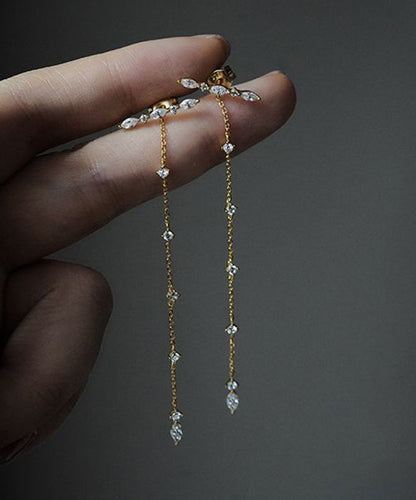 Schmale Ohrhänger aus Sterlingsilber mit Zirkonia-Quaste, verziert mit zarten Seidenquasten und vergoldeten Strasssteinen