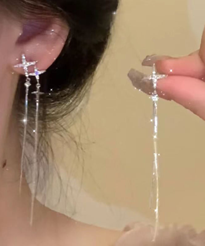 Pendientes de plata de ley con borlas y estrellas asimétricas de circonitas y seda fina