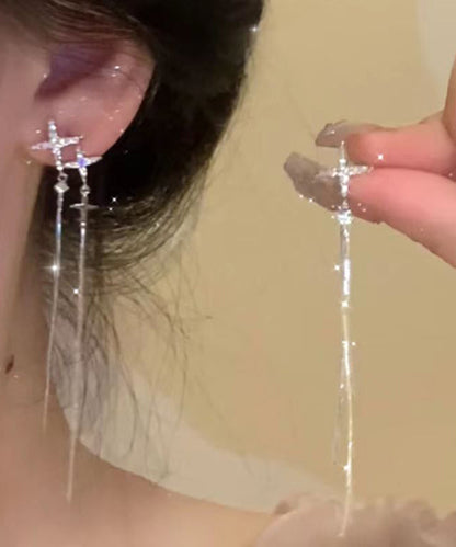 Pendientes de plata de ley con borlas y estrellas asimétricas de circonitas y seda fina