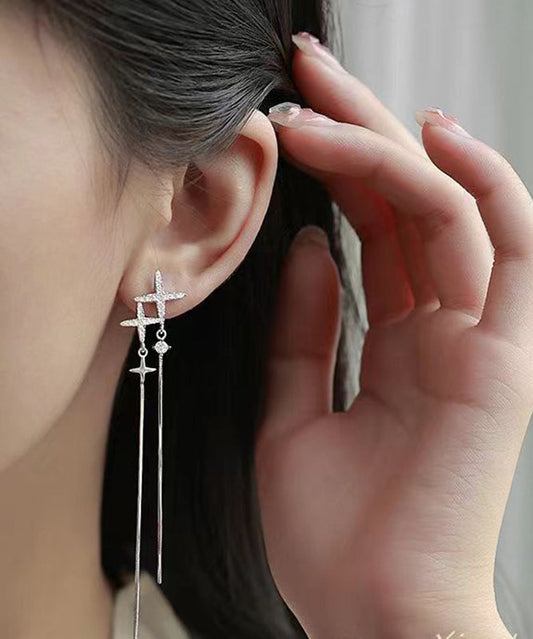 Pendientes de plata de ley con borlas y estrellas asimétricas de circonitas y seda fina