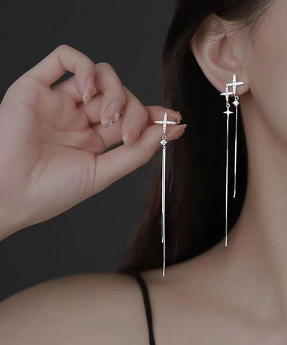 Pendientes de plata de ley con borlas y estrellas asimétricas de circonitas y seda fina