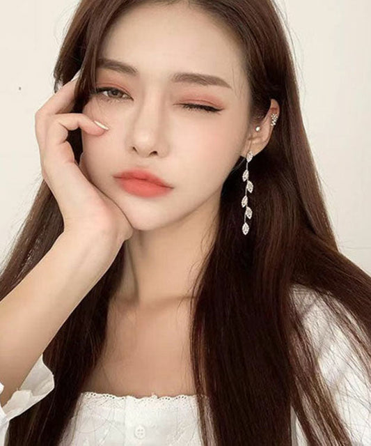 Pendientes finos de seda con borlas y hojas de circonita en plata de ley