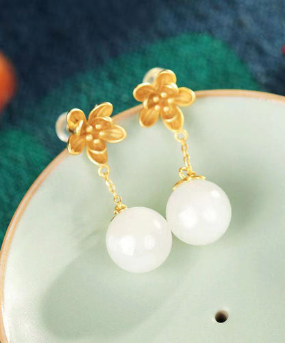 Pendientes colgantes finos de jade floral en oro antiguo blanco
