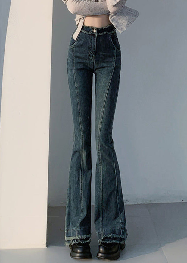 Schmal geschnittene, blaue Jeans mit originellem Design, Taschen und ausgestellten Beinen – ideal für den Frühling