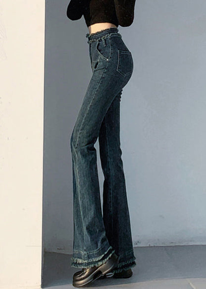 Schmal geschnittene, blaue Jeans mit originellem Design, Taschen und ausgestellten Beinen – ideal für den Frühling