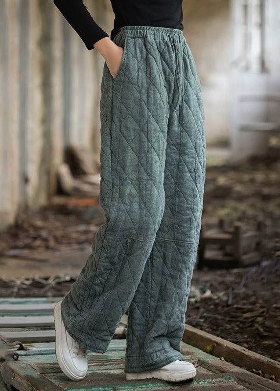 Schmal geschnittene blaue Winterhose mit Taschen, elastischem Bund und Baumwollfüllung