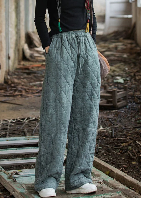 Schmal geschnittene blaue Winterhose mit Taschen, elastischem Bund und Baumwollfüllung