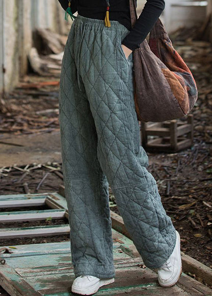 Schmal geschnittene blaue Winterhose mit Taschen, elastischem Bund und Baumwollfüllung
