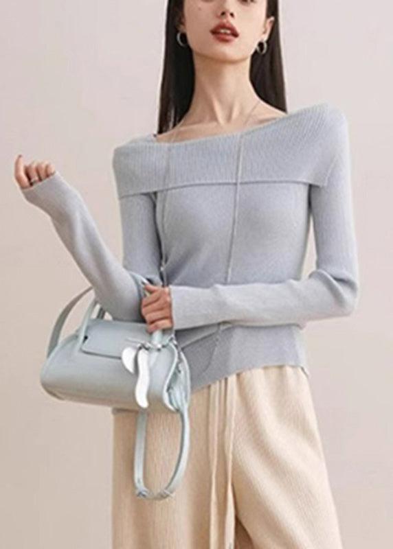 Suéter de punto de algodón azul de cuello oblicuo y corte entallado para primavera