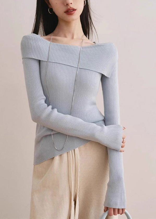 Suéter de punto de algodón azul de cuello oblicuo y corte entallado para primavera