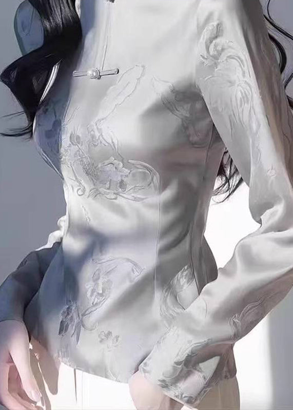 Tops con cuello alto gris ajustado y estampado de otoño