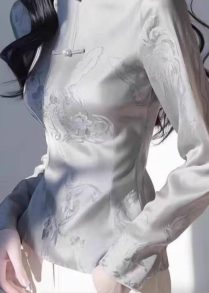 Tops con cuello alto gris ajustado y estampado de otoño