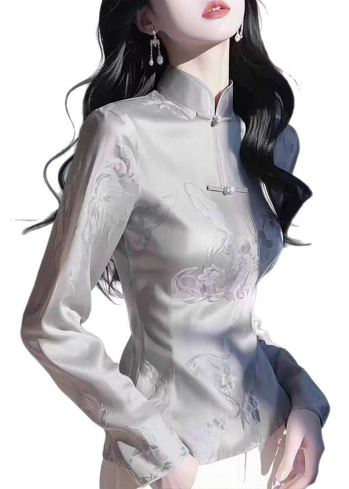 Tops con cuello alto gris ajustado y estampado de otoño