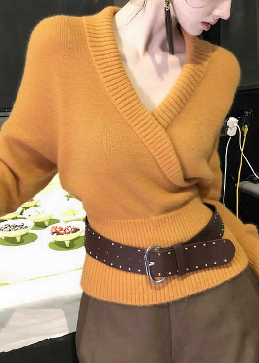 Suéter de punto acogedor con cuello en V naranja y corte entallado para primavera