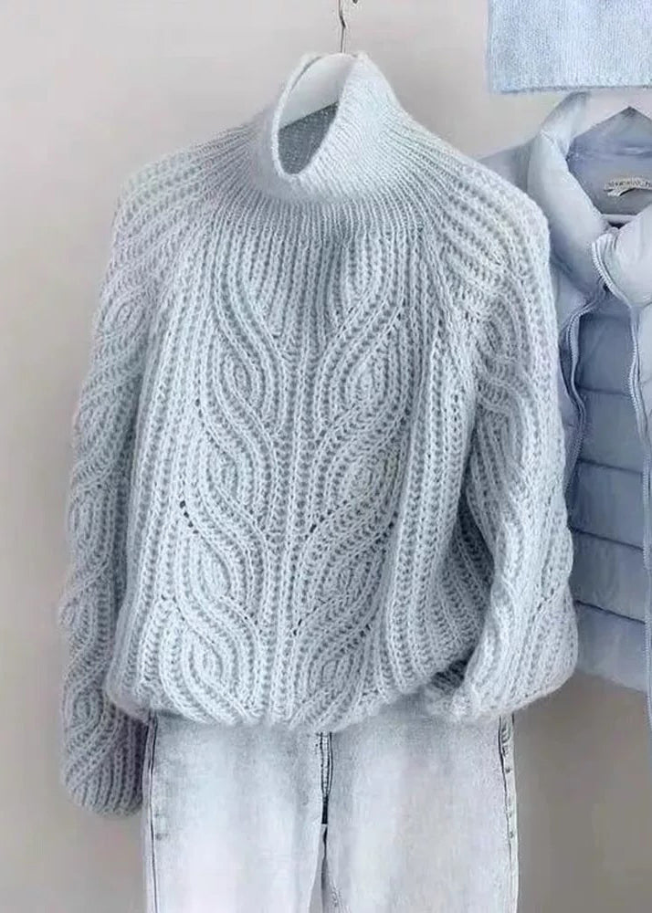 Suéteres de punto de cable de algodón acogedores con cuello alto azul y mangas farol