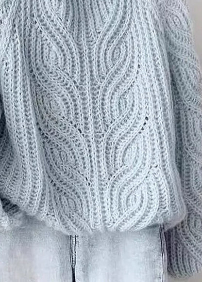 Suéteres de punto de cable de algodón acogedores con cuello alto azul y mangas farol