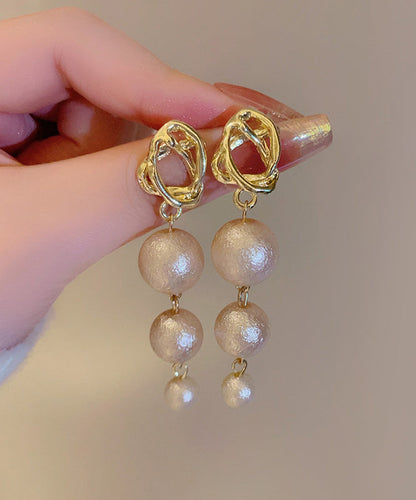 Ohrhänger aus Goldlegierung mit Perlenquaste