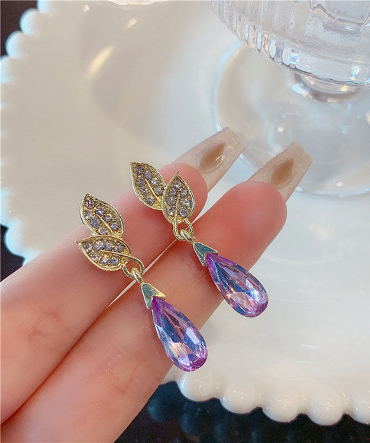 Pendientes de gota de agua con hojas de cristal de circonita incrustadas en cobre dorado