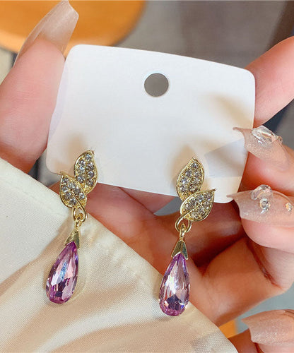 Pendientes de gota de agua con hojas de cristal de circonita incrustadas en cobre dorado