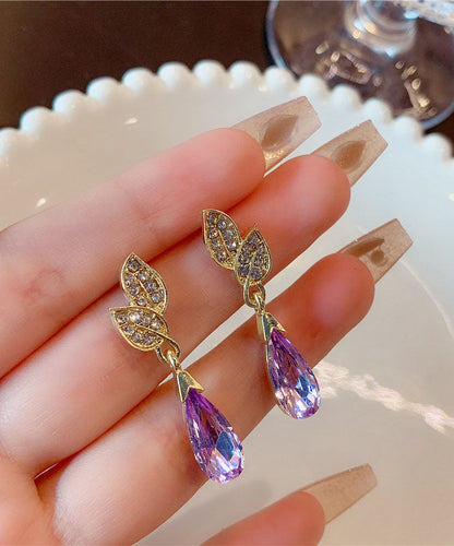 Pendientes de gota de agua con hojas de cristal de circonita incrustadas en cobre dorado