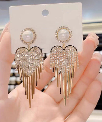 Pendientes colgantes con borlas de perla y circonitas doradas y cobre dorado