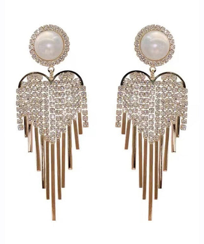 Pendientes colgantes con borlas de perla y circonitas doradas y cobre dorado