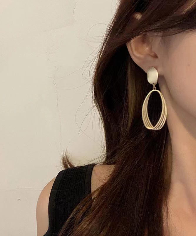 Pendientes colgantes ovalados de plata de ley dorada con estilo